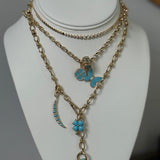 Graduated Bezel Diamond And Gold Disc Chain Necklace