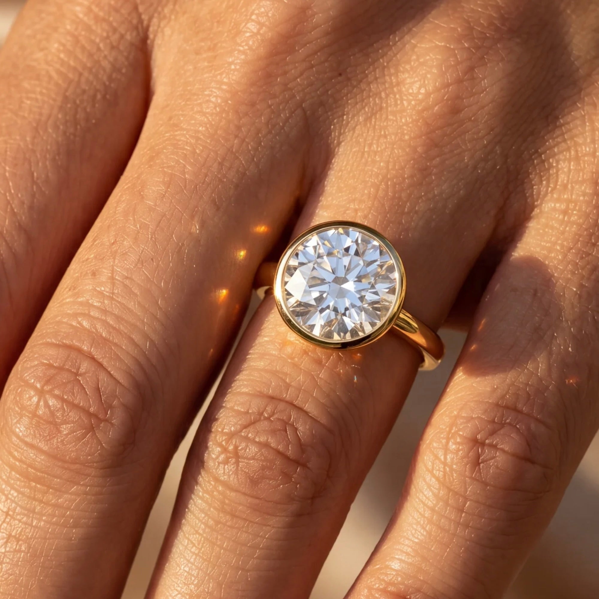 18K Yellow Gold Round Diamond In A Bezel Setting Ring